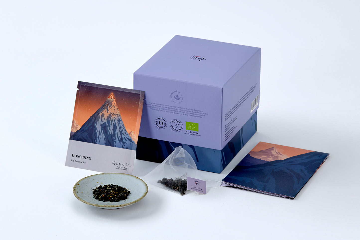 Organic Dong Ding oolong tea box, tea sachet, loose tea leaves, and packaging from Tingyu x Art by Stephan Schmitz