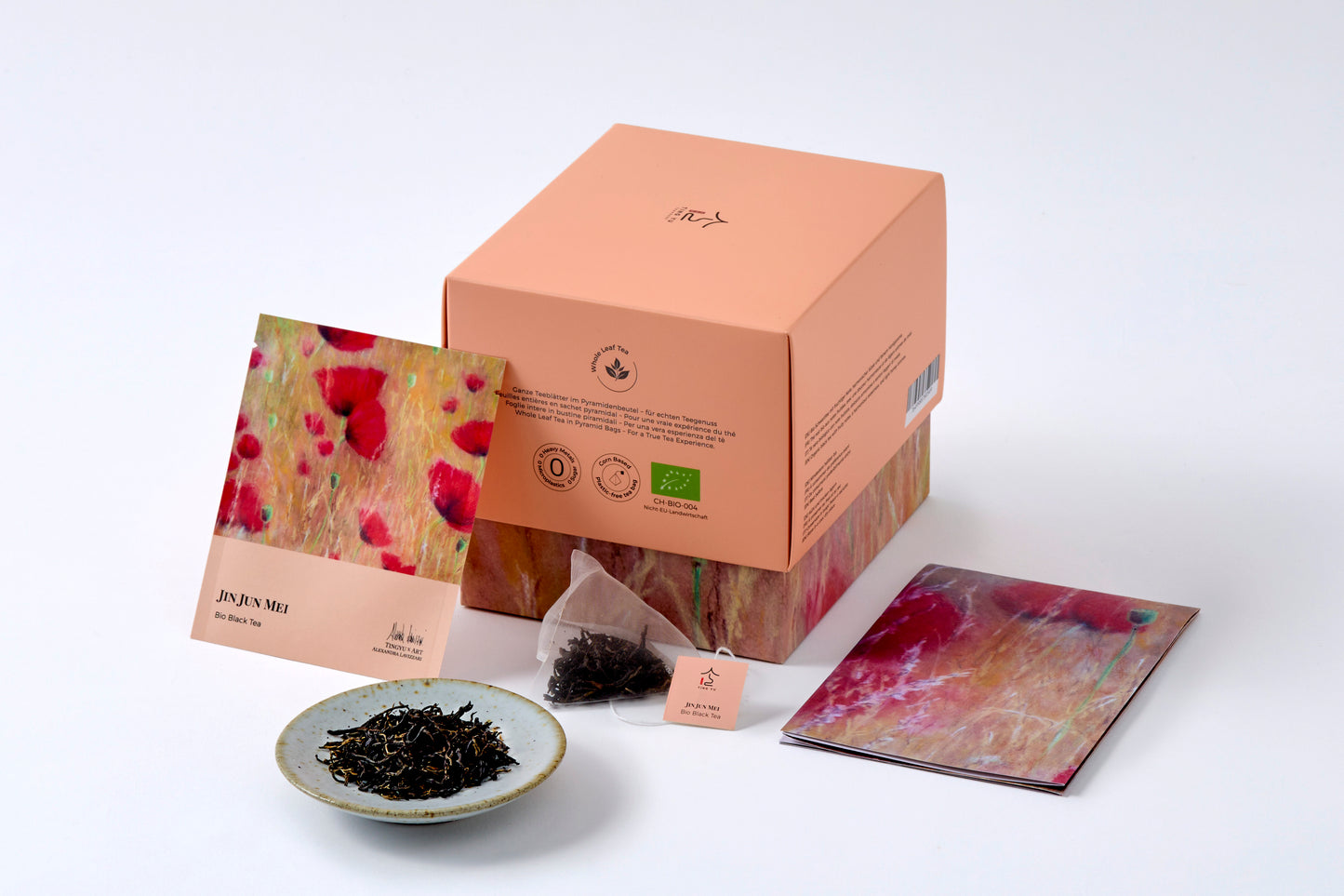 Organic Jin Jun Mei black tea box, tea sachet, loose tea leaves, and packaging from Tingyu x Art by Alexandra Lavizzari