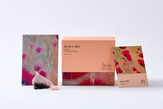Organic Jin Jun Mei black tea box, tea sachet, and loose tea leaves from Tingyu x Art by Alexandra Lavizzari