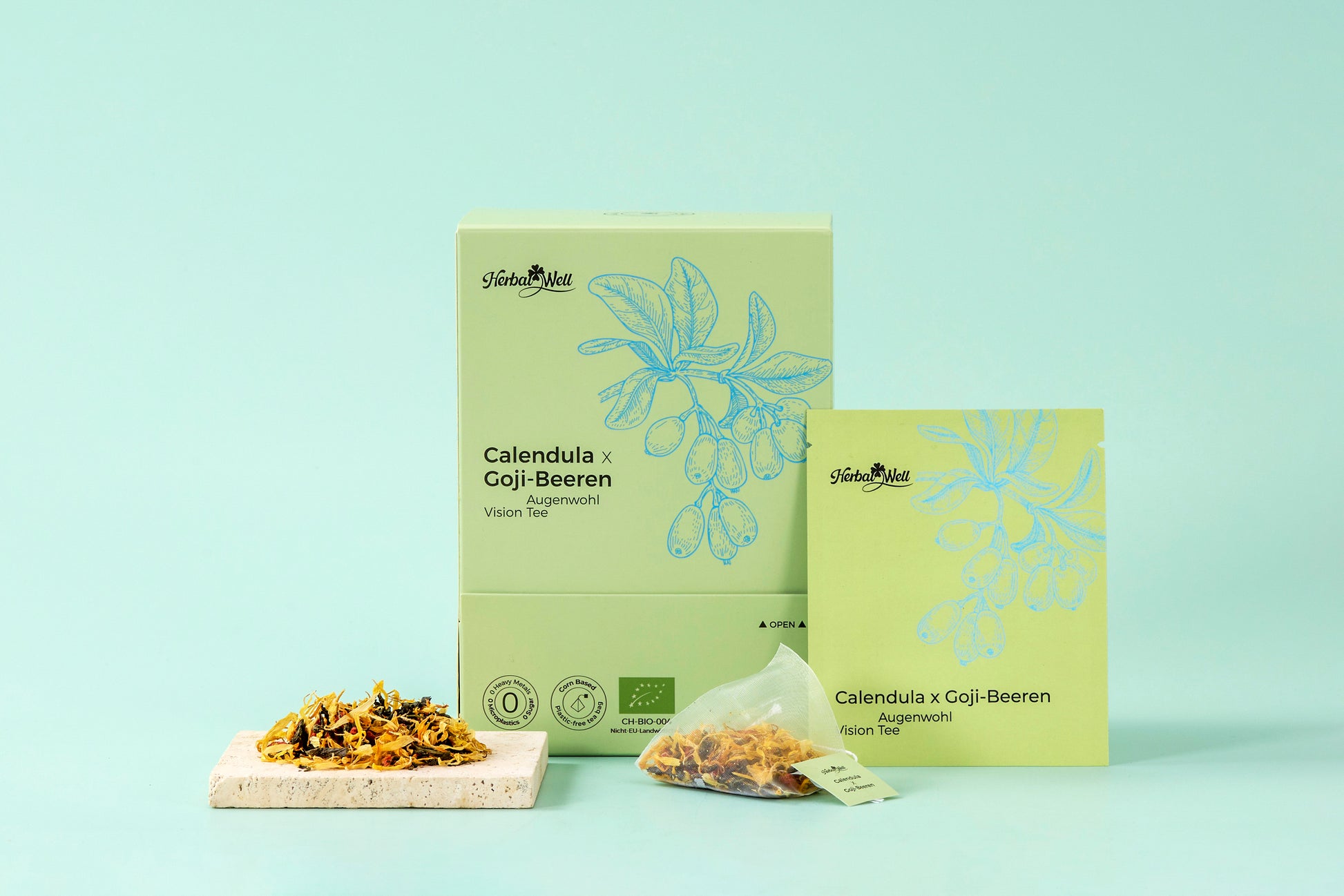 Calendula and Goji tea box, tea sachet, and loose ingredients by HerbalWell